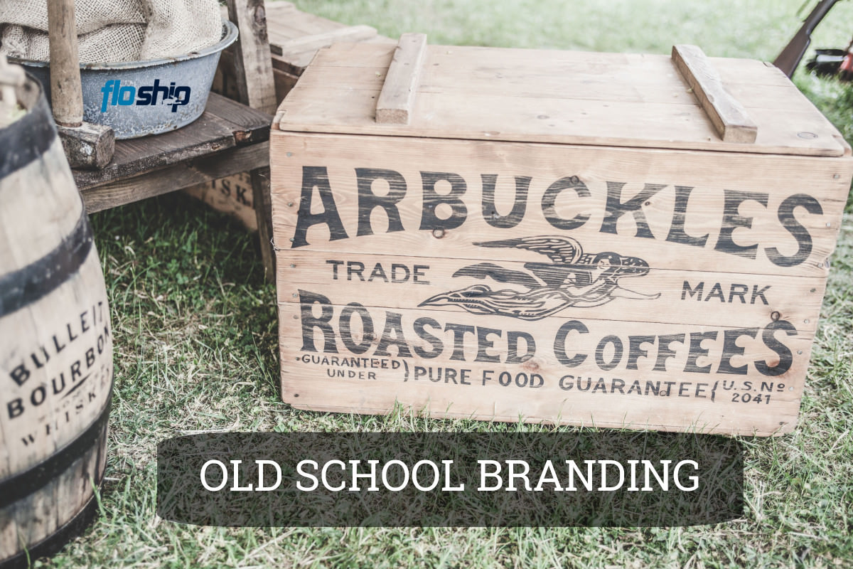 wooden shipping boxes with logos stamped on them