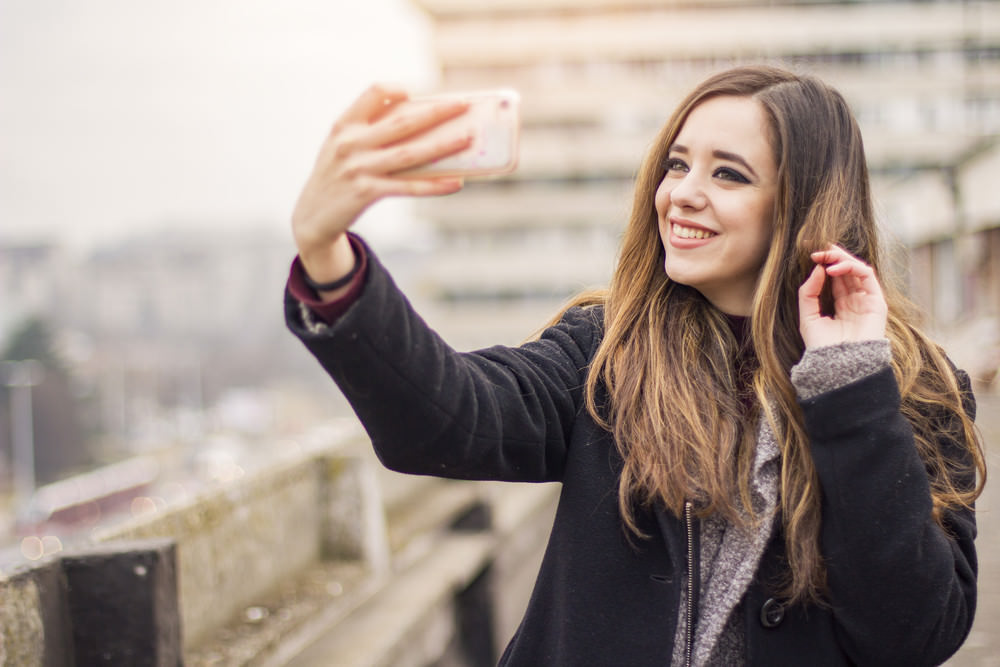 girl taking selfie of herself