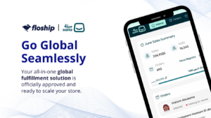 Hero banner with Floship and Salla logos, the bold headline 'Go Global Seamlessly' and a tilted smartphone screen showing a sales dashboard and orders summary (marketing image).